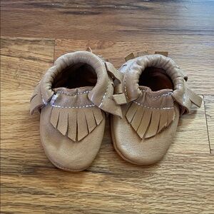 Brown baby moccasins